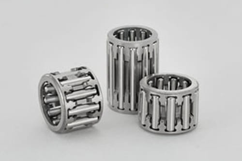 Caged needle roller bearings for high speed planetary gears